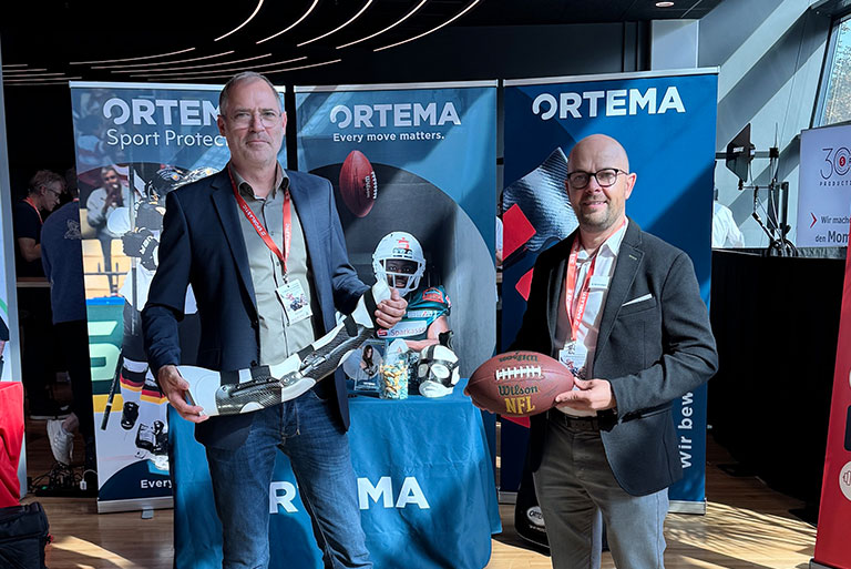 Mitarbeiter beim Medical Symposium American Football